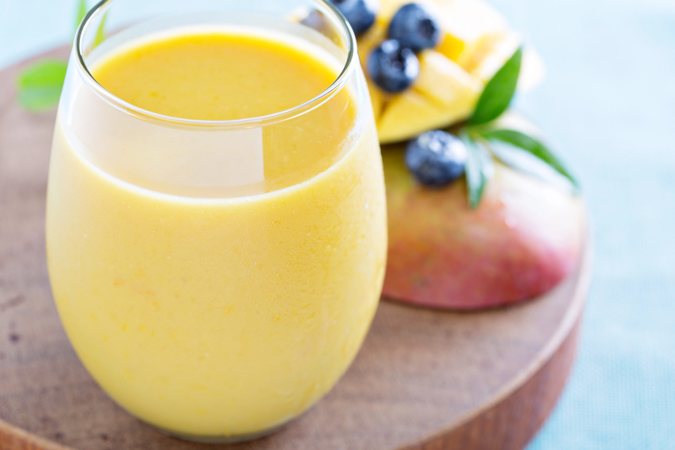 Mango,Smoothie,Fresh,And,Bright,On,A,Board